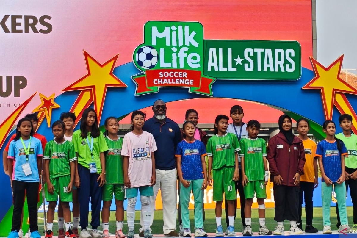 MLSC All-Stars head coach Jacksen Tiago with the U12 players selected for SingaCup 2026 at the closing event in Kudus
